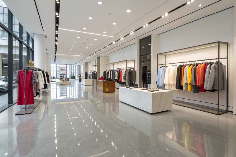 High-gloss epoxy flooring in Newcastle retail boutique reflecting light